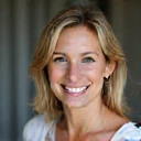 Client testimonial photo of a smiling woman