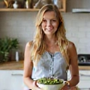 Client Emily R. enjoying a healthy meal